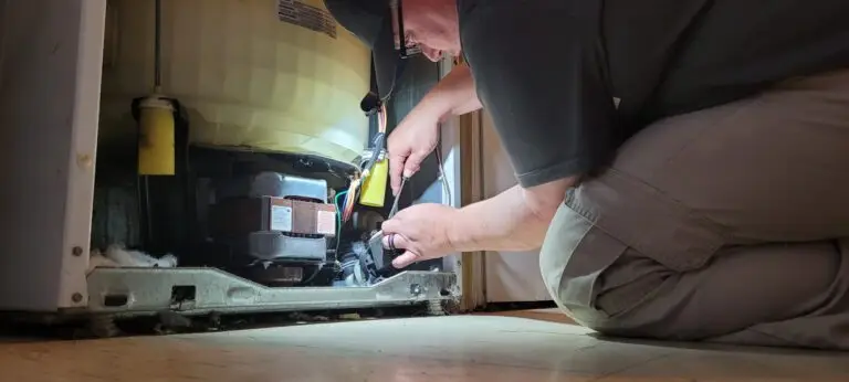 Professional technician repairing a washing machine, illustrating the expert services provided by BA Appliance Repair Service.