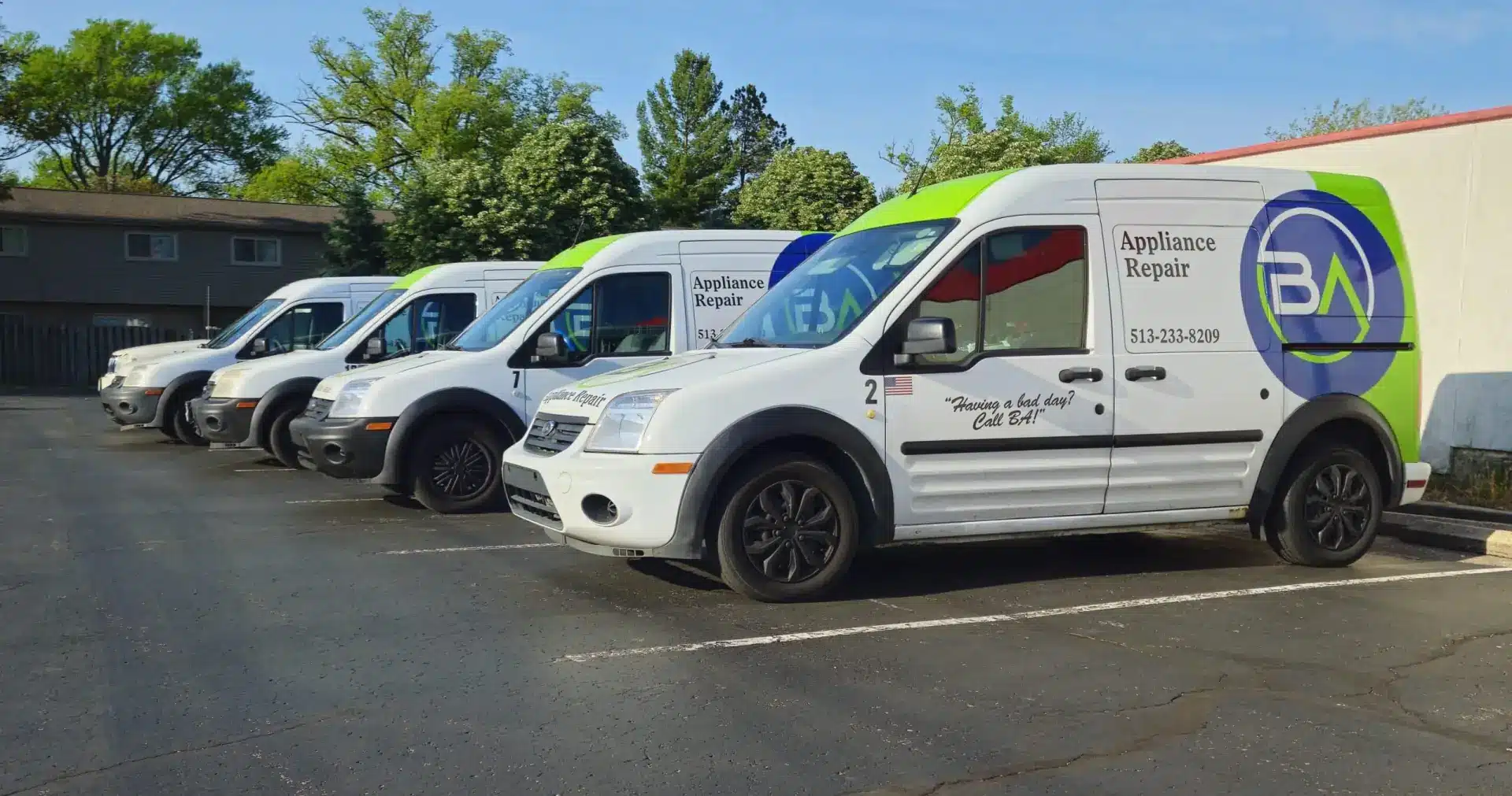 BA Appliance Repair Service's branded service vans lined up in Cincinnati